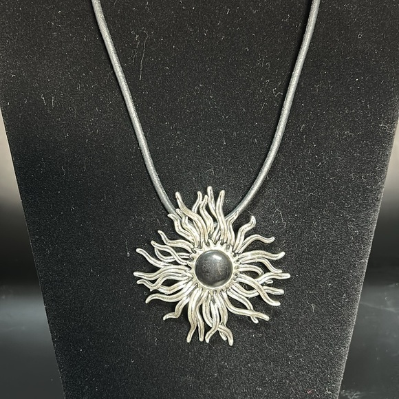 Silvertone sunburst necklace and earring set. Leather strap. - Picture 3 of 9